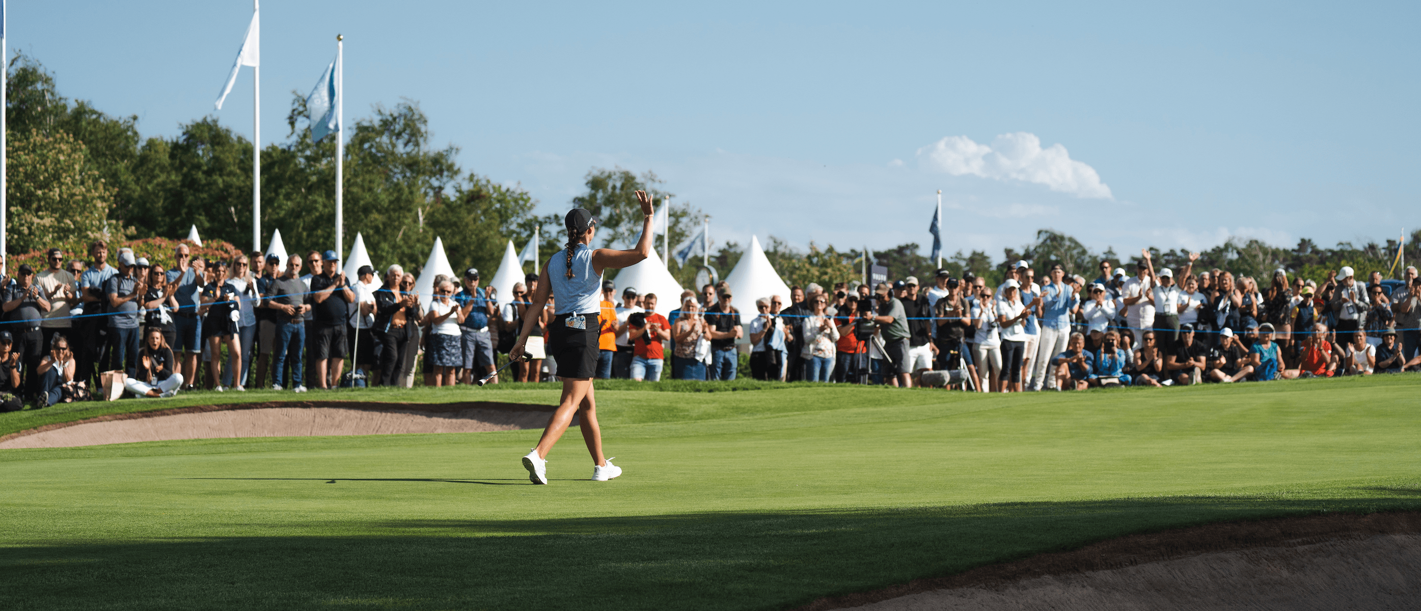 Linn grant waving to crowd